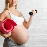 pregnant-woman-making-fitness-exercise-23-2148352216--1-