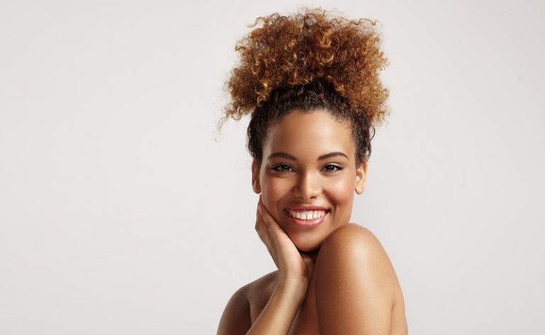 closeup portrait of a black woman with ideal skin