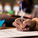 Team of college students working on a project related to business management